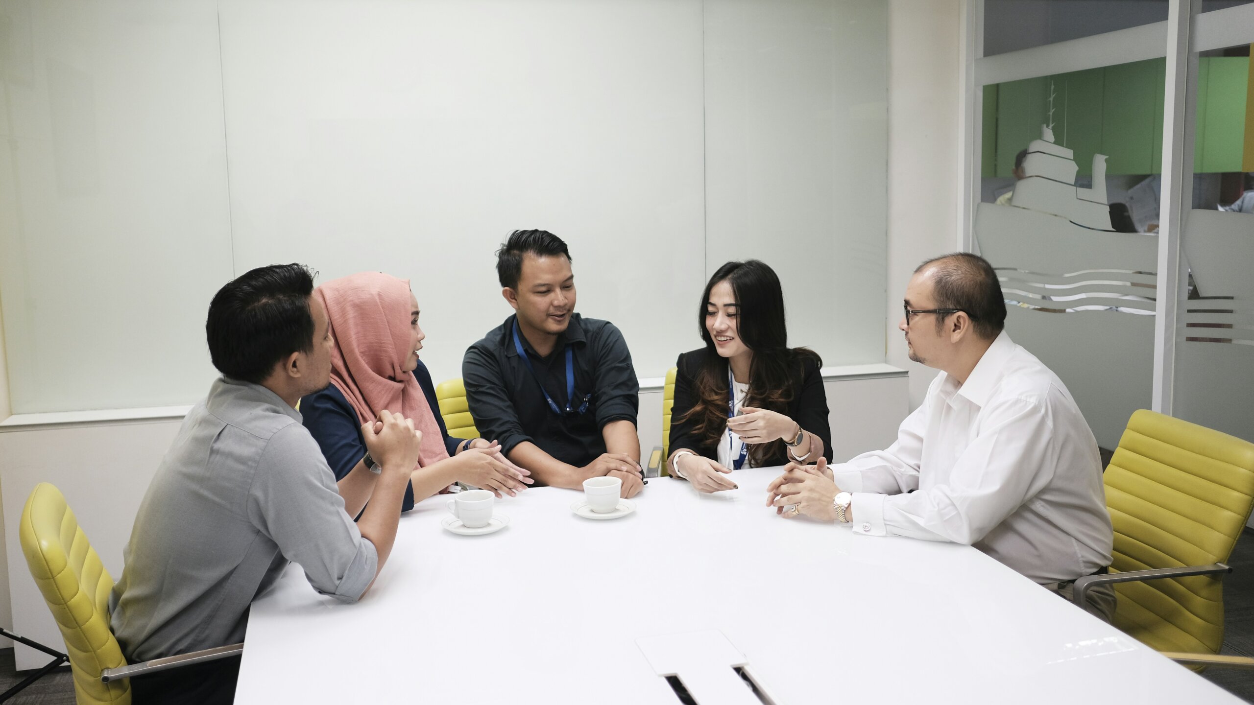 A team of mental health professionals discussing a treatment plan